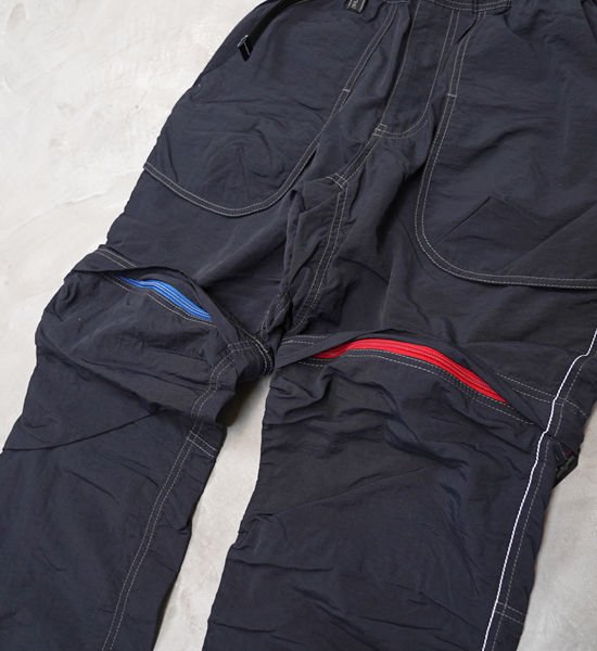 【and wander】アンドワンダー women's NY taffeta hiker 2way pants "Black"