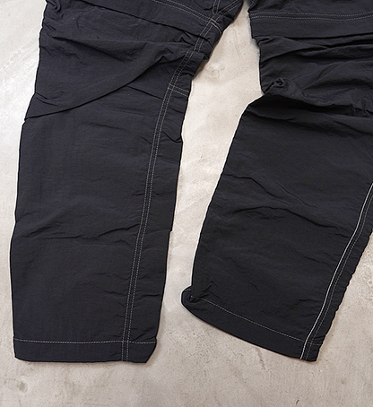 【and wander】アンドワンダー women's NY taffeta hiker 2way pants "Black"